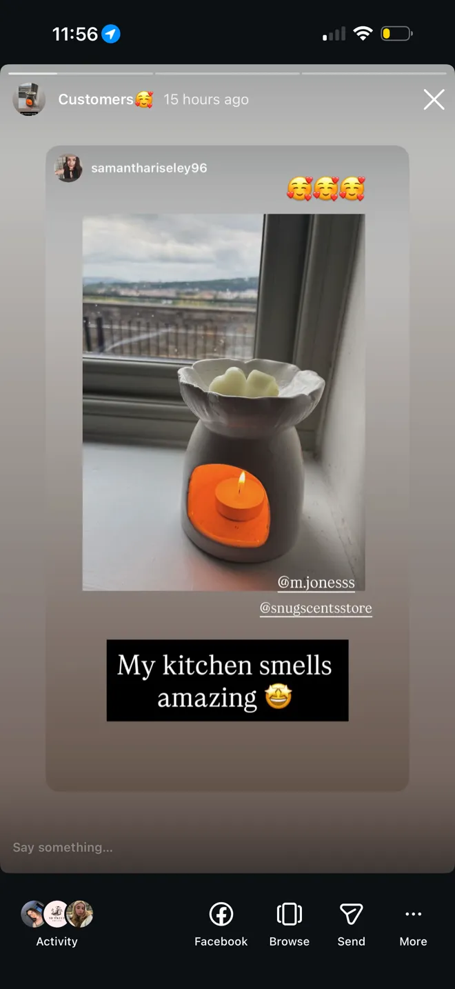 A customer's wax warmer melting Snug Scents wax melts on a windowsill