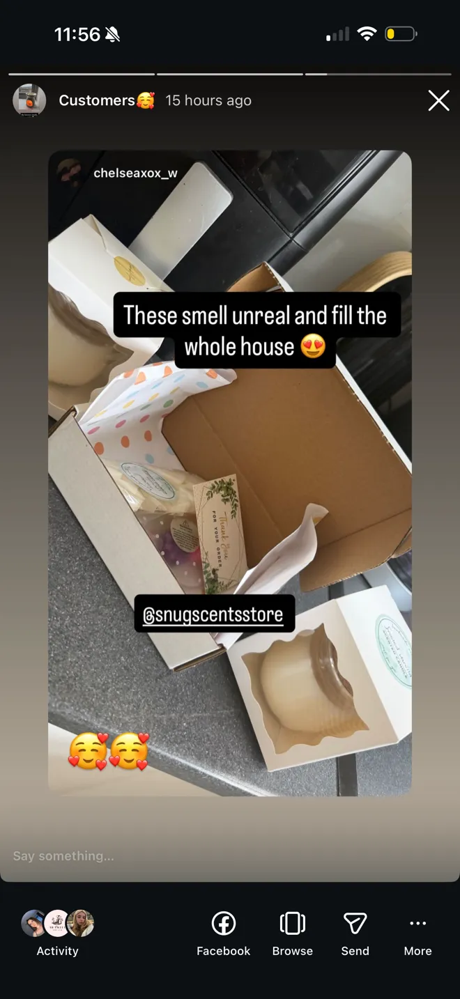 A customer unboxing a Snug Scents order of candles and wax melts
